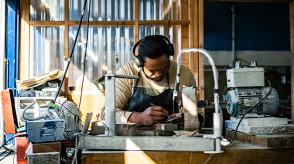 Man and woman behind counter in cafe